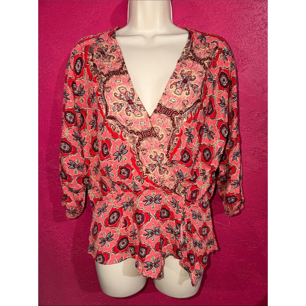 Free People Falling for You hi low peplum vibrant floral print top. Sz L.